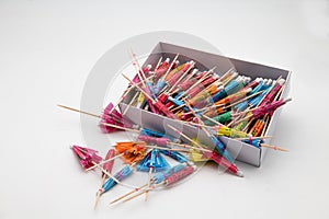 Box of oriental style cocktail sticks