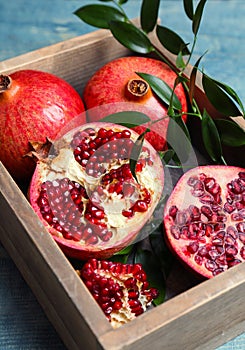 Box with pomegranates photo