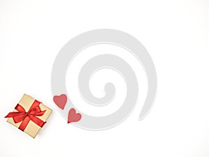 A box with a red bow and two red hearts on a white background. Concept Greetings, Valentine`s Day, Love.