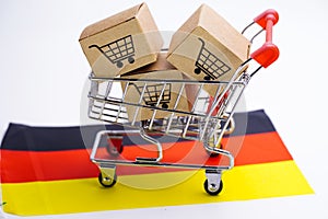 Box with shopping cart logo and Germany flag : Import Export Shopping online or eCommerce delivery service store product shipping,