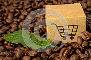 Box with shopping cart logo symbol on coffee beans
