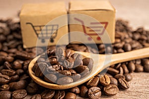 Box with shopping cart logo symbol on coffee beans, Import Export Shopping online or eCommerce delivery service store product