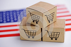 Box with shopping cart logo and United State of America USA flag : Import Export Shopping online or eCommerce