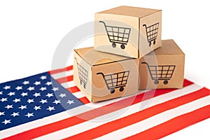 Box with shopping cart logo and USA America flag, Import Export Shopping online or eCommerce finance delivery service store