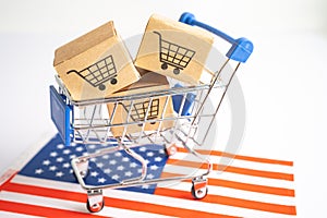 Box with shopping cart logo and USA America flag, Import Export Shopping online or eCommerce finance delivery service store