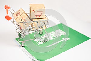 Box with shopping online cart logo and Saudi Arabia flag, Import Export commerce finance delivery trade