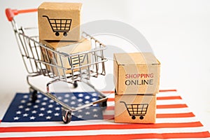 Box with shopping online cart logo and USA America flag, Import Export Shopping online or commerce finance delivery service store