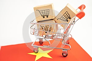 Box with shopping online cart logo and Vietnam flag, Import Export Shopping online or commerce finance delivery service store