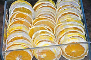 Box of sliced fresh oranges