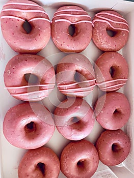 Box of Sweet Pink Glazed Iced Doughnuts Donuts Strawberry