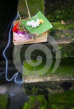 Box with traditional balinese morning offerings or Canang sari, Ubud, Bali