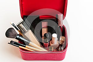 A box of various cosmetics and brushes isolated on white background, Top view, Beauty concept