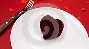 Box witha ring, table setting on a red background. Concept Valentine`s Day. - Image photo