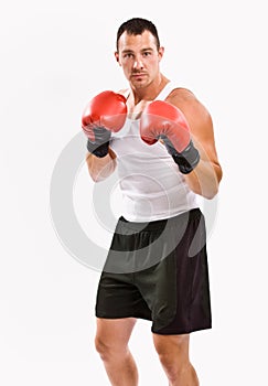 Boxer in boxing gloves training