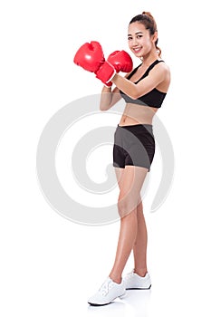 Boxer - Full length fitness woman boxing wearing boxing red gloves