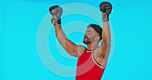 Boxer, man and celebration, winner or champion in studio isolated on a blue background mockup. Athlete, boxing sports