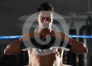 Boxer, man and gym with sport, boxing ring and confidence for workout or training. Person, exercise and fitness for