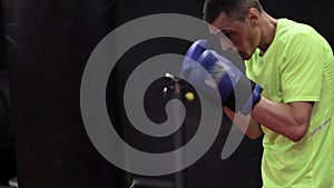 Boxer practicing in practice hall