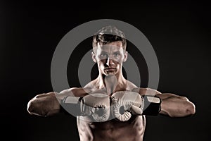 Boxer with strong hands ready to fight