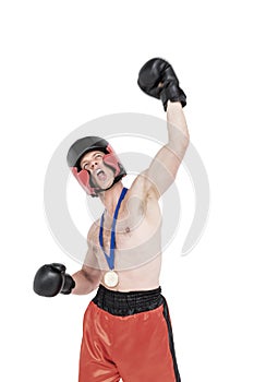 Boxer wearing gold medal performing boxing stance