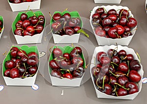 Boxes of cherries on sale in the Cours Saleya Market in the old town of Nice, France