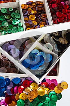 Boxes of colourful buttons