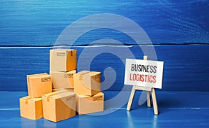 Boxes and easel with Business logistics. Supply chain management and efficiency logistics. Engaging intermediaries, marketing