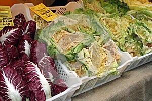 Boxes with fresh seasonal vegetables on sale from greengrocers photo