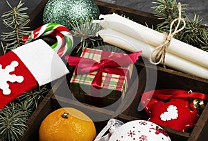 Boxes with gifts for Christmas and various attributes of holiday