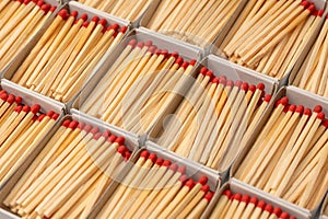 Boxes with new matchsticks as a background