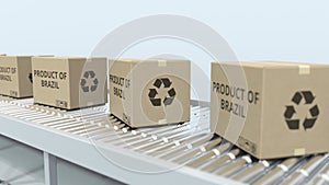 Boxes with PRODUCT OF BRAZIL text on roller conveyor. Brazilian import or export related 3D rendering