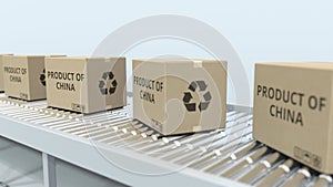 Boxes with PRODUCT OF CHINA text on roller conveyor. Chinese import or export related 3D rendering