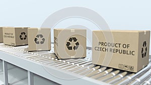 Boxes with PRODUCT OF CZECH REPUBLIC text on roller conveyor. Import or export related 3D rendering