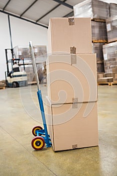 Boxes on trolley in warehouse