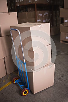 Boxes on trolley in warehouse