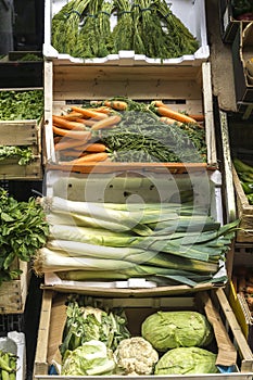 Boxes with vegetables in street fair stall