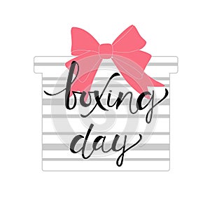 BOXING DAY, banner with Boxing Day lettering text on gift box with pink ribbon.