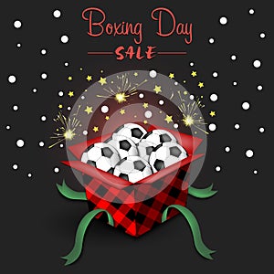 Boxing day. Open gift box with soccer balls