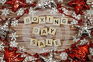 Boxing Day Sale alphabet letter on wooden background with Christmas ornament decoration