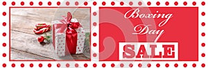 Boxing Day Sale banner design. Gift on table and text