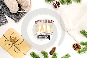 Boxing day sale with Christmas present and xmas decoration on white background