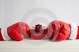 Boxing day shopping creative idea. Boxing glove with gift box.