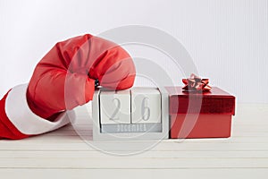 Boxing day shopping creative idea. Boxing glove with gift box and calendar.