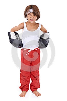 Boxing, fight and angry portrait of child in with courage for martial arts in white background. Challenge, boxer or kid