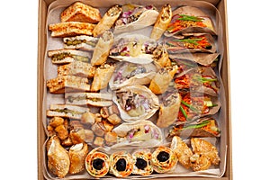 Boxing with food, cardboard box with snacks, home delivery. Catering. Gift for any holiday. Ready family dinner, party food