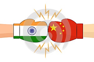 Boxing gloves between India and China flags on white background