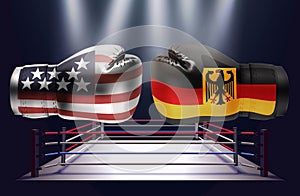 Boxing gloves with prints of the USA and German flags facing ea