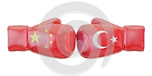 Boxing gloves with Turkey and China flags. Governments conflict photo