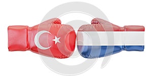 Boxing gloves with Turkey and Netherlands flags. Governments con photo