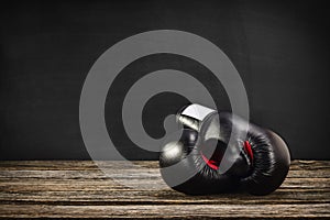 Boxing gloves on wooden background